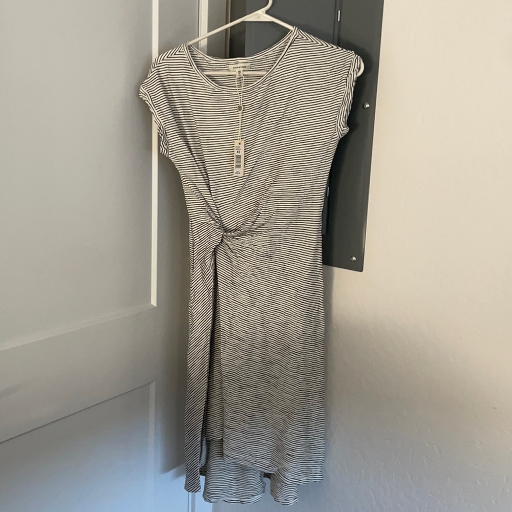 Super cute never worn. Was too small when I bought it